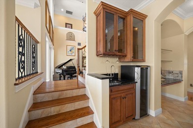 Nestled in the highly coveted Harbor Bluffs community, this