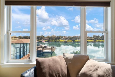 Nestled in the highly coveted Harbor Bluffs community, this