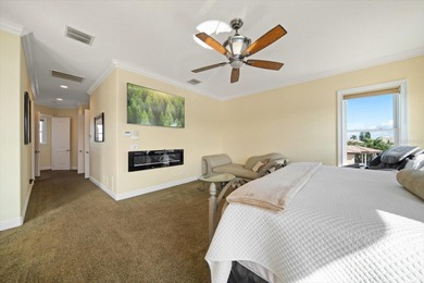 Nestled in the highly coveted Harbor Bluffs community, this