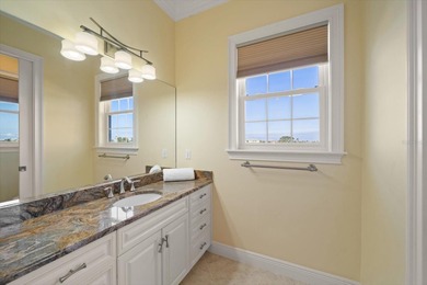 Nestled in the highly coveted Harbor Bluffs community, this