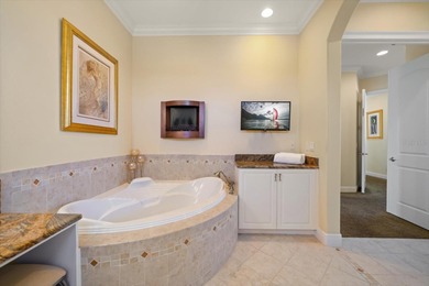 Nestled in the highly coveted Harbor Bluffs community, this