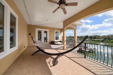 Nestled in the highly coveted Harbor Bluffs community, this