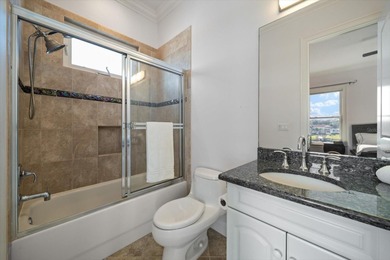 Nestled in the highly coveted Harbor Bluffs community, this