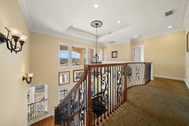 Nestled in the highly coveted Harbor Bluffs community, this