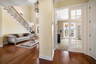 Nestled in the highly coveted Harbor Bluffs community, this