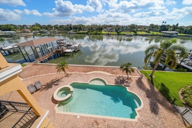 Nestled in the highly coveted Harbor Bluffs community, this