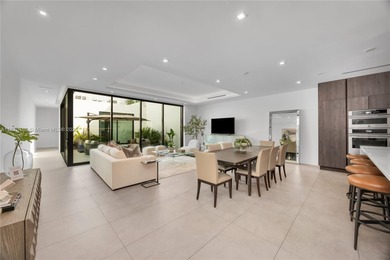 Built in 2021, this 7 bedroom, 5.5 bathroom townhouse has all of