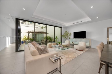 Built in 2021, this 7 bedroom, 5.5 bathroom townhouse has all of