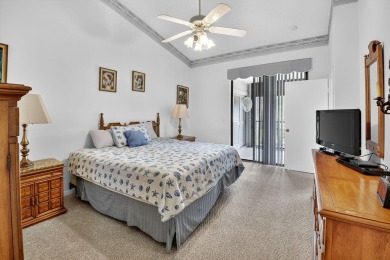 This two bedroom plus den, two full bath condo offers care-free