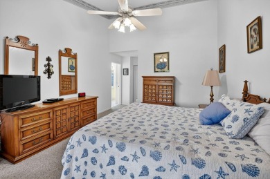 This two bedroom plus den, two full bath condo offers care-free