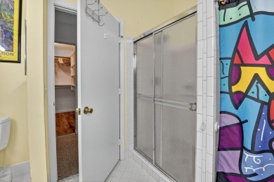This two bedroom plus den, two full bath condo offers care-free