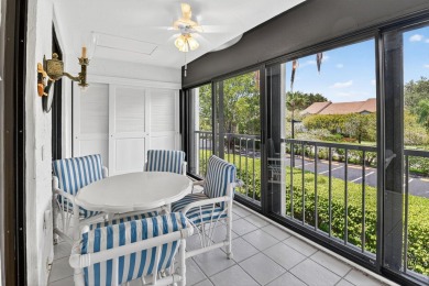 This two bedroom plus den, two full bath condo offers care-free