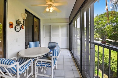 This two bedroom plus den, two full bath condo offers care-free