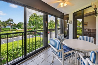 This two bedroom plus den, two full bath condo offers care-free