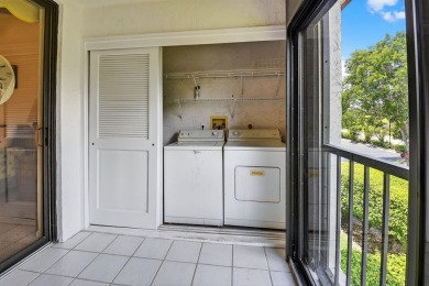 This two bedroom plus den, two full bath condo offers care-free