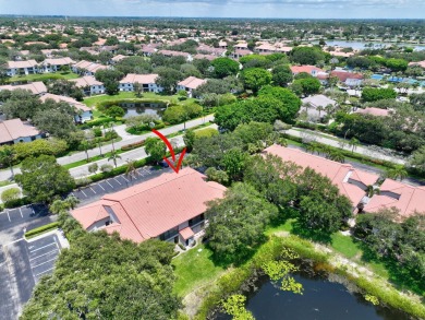 This two bedroom plus den, two full bath condo offers care-free