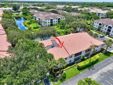 This two bedroom plus den, two full bath condo offers care-free