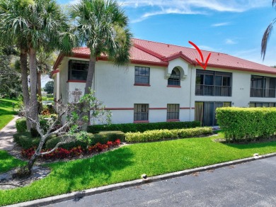 This two bedroom plus den, two full bath condo offers care-free