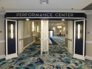 This two bedroom plus den, two full bath condo offers care-free