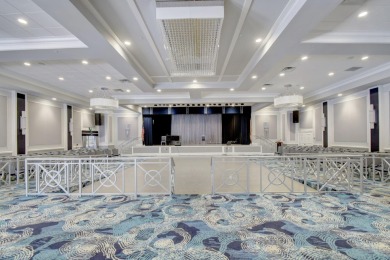 This two bedroom plus den, two full bath condo offers care-free