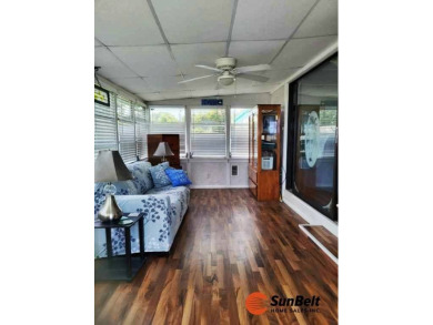 This well-maintained manufactured home, located at 918 Reed