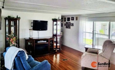 This well-maintained manufactured home, located at 918 Reed