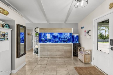 Waterfront living is within reach. This lovely home sits on a