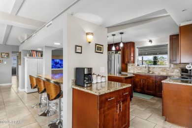 Waterfront living is within reach. This lovely home sits on a