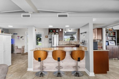 Waterfront living is within reach. This lovely home sits on a