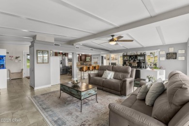 Waterfront living is within reach. This lovely home sits on a