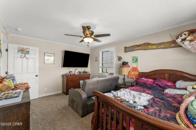 Waterfront living is within reach. This lovely home sits on a