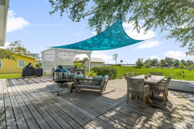 Waterfront living is within reach. This lovely home sits on a