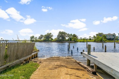 Waterfront living is within reach. This lovely home sits on a