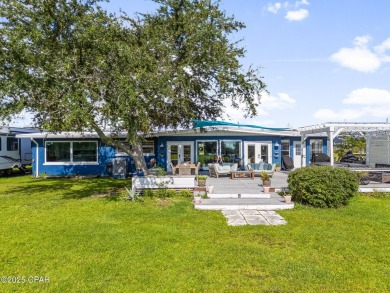 Waterfront living is within reach. This lovely home sits on a