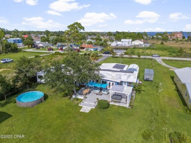 Waterfront living is within reach. This lovely home sits on a