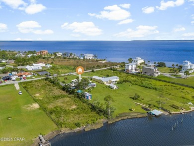 Waterfront living is within reach. This lovely home sits on a