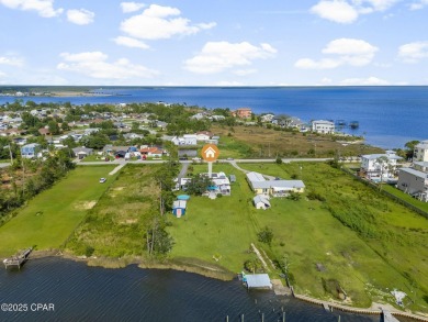 Waterfront living is within reach. This lovely home sits on a