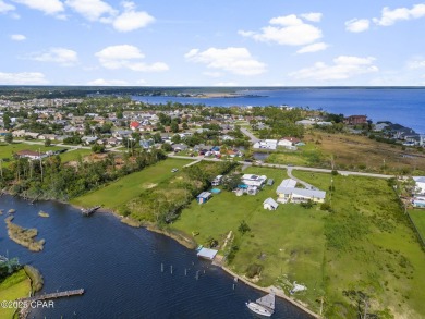 Waterfront living is within reach. This lovely home sits on a