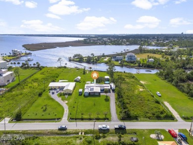 Waterfront living is within reach. This lovely home sits on a