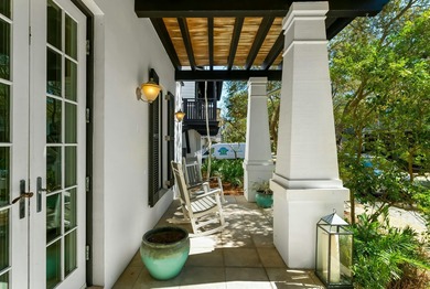 Nestled south of 30A on a coveted corner lot, this extraordinary