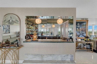 Soak in stunning Intracoastal sunsets from this rare 7th-floor