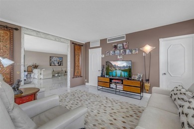 Soak in stunning Intracoastal sunsets from this rare 7th-floor