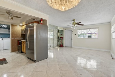 Welcome to this charming 3-bedroom, 2-bathroom corner lot home