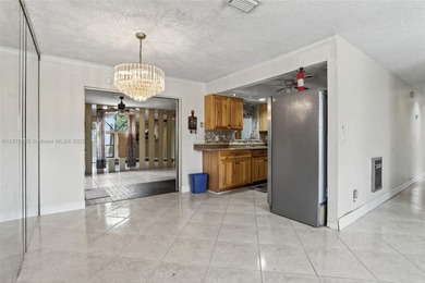 Welcome to this charming 3-bedroom, 2-bathroom corner lot home