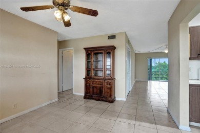 Move-in ready 1/1 top-floor unit with tile floors throughout