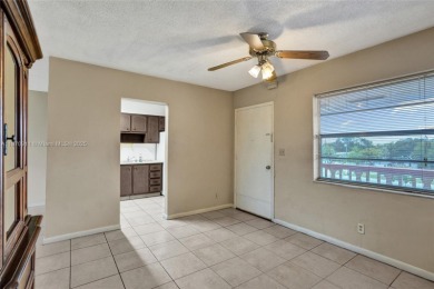 Move-in ready 1/1 top-floor unit with tile floors throughout