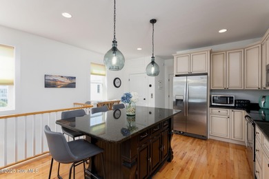 ''A Wave from it All!'' Looking for a refined coastal home where