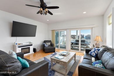 ''A Wave from it All!'' Looking for a refined coastal home where