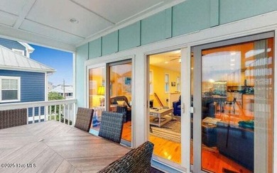 ''A Wave from it All!'' Looking for a refined coastal home where