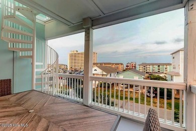 ''A Wave from it All!'' Looking for a refined coastal home where